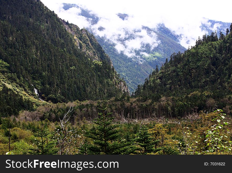 Distant mountains and a county named Yubeng,Yunnan,China. Distant mountains and a county named Yubeng,Yunnan,China