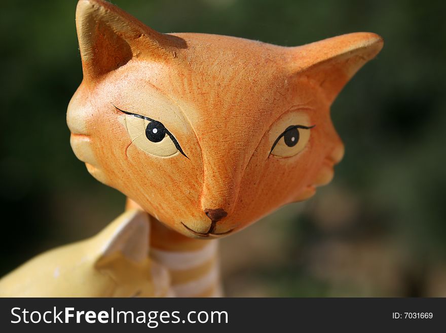 Close-up of ceramic orange cat. Close-up of ceramic orange cat
