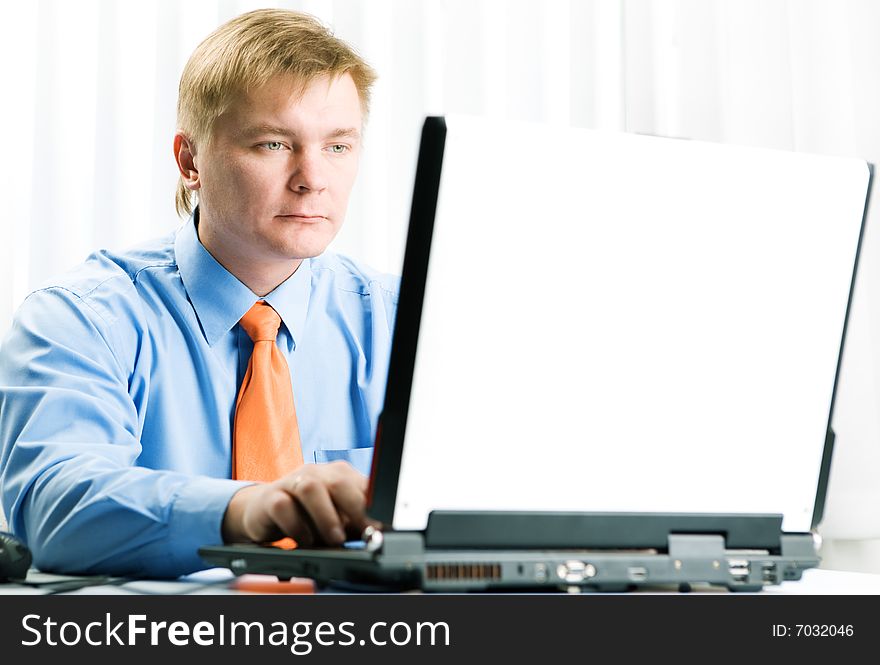 Young  businessman with laptop