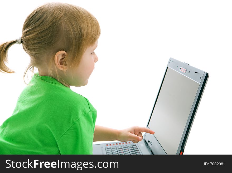 Child with laptop show finger in screen on white background