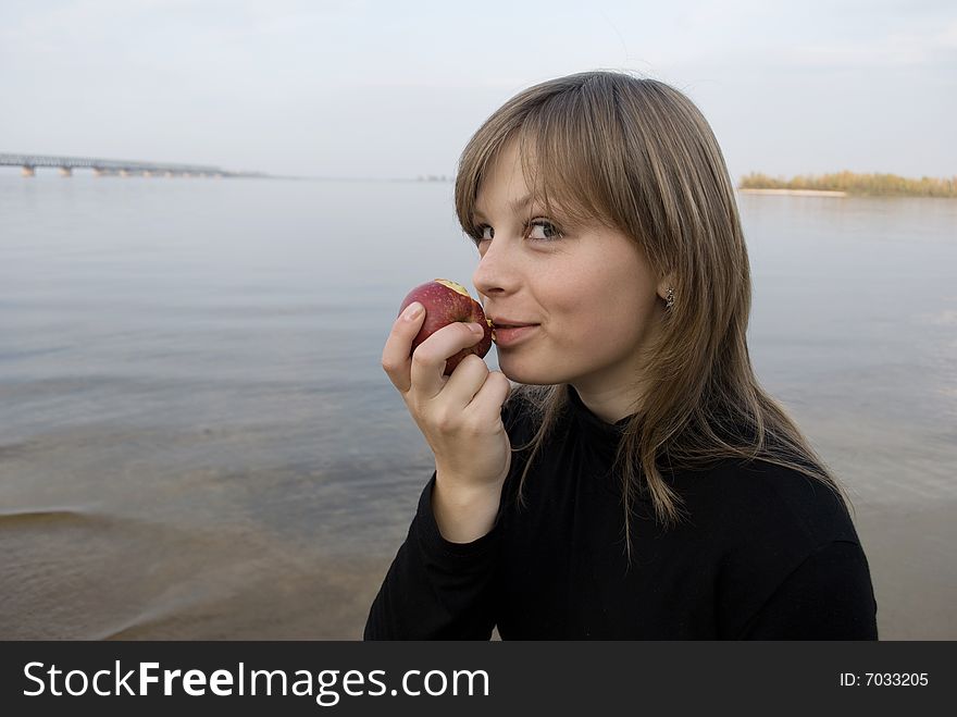 beautiful girl with an apple