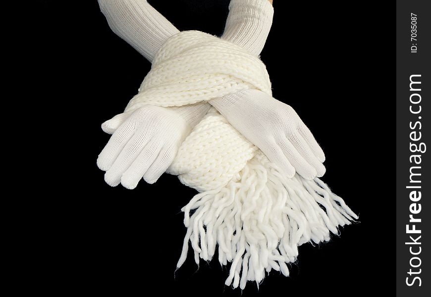 Hands in gloves and scarf