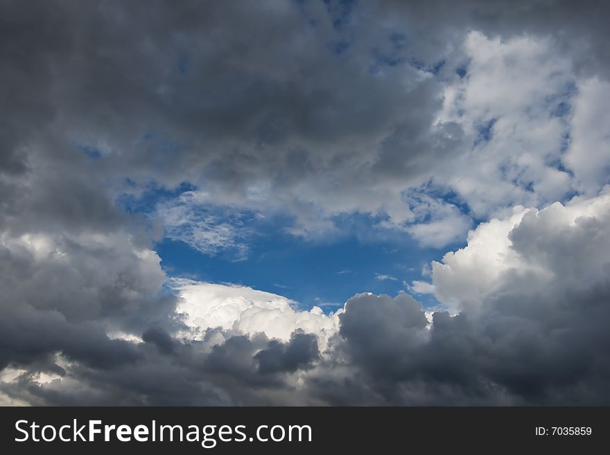 Blue sky with heavy clouds. Blue sky with heavy clouds