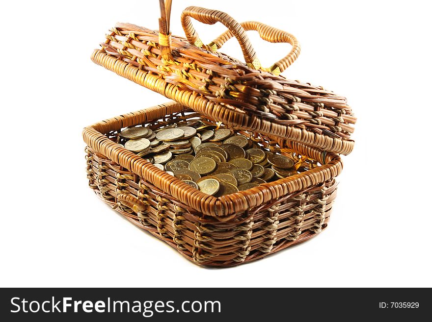 Coins in a casket. Isolated on an white background. Coins in a casket. Isolated on an white background