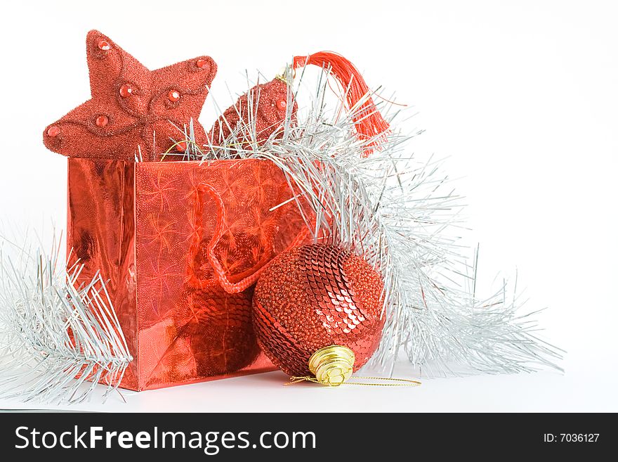 Red Bag With Christmas Toys On White Background
