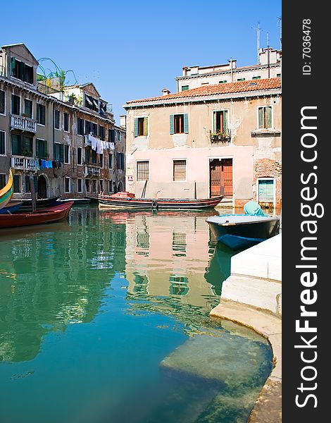 A typical canal in Venice in summer. A typical canal in Venice in summer