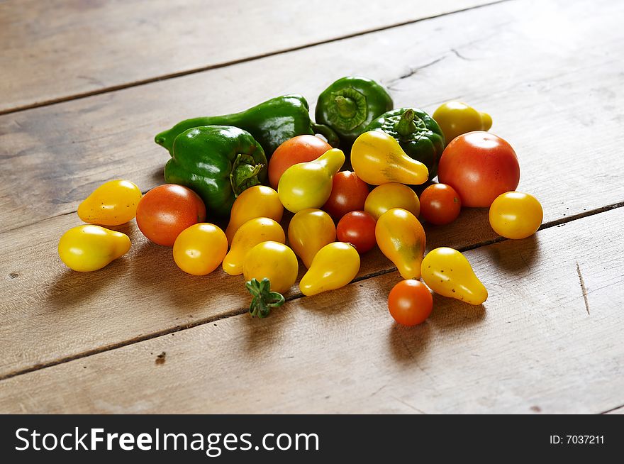 Group of different tomato and green pepper