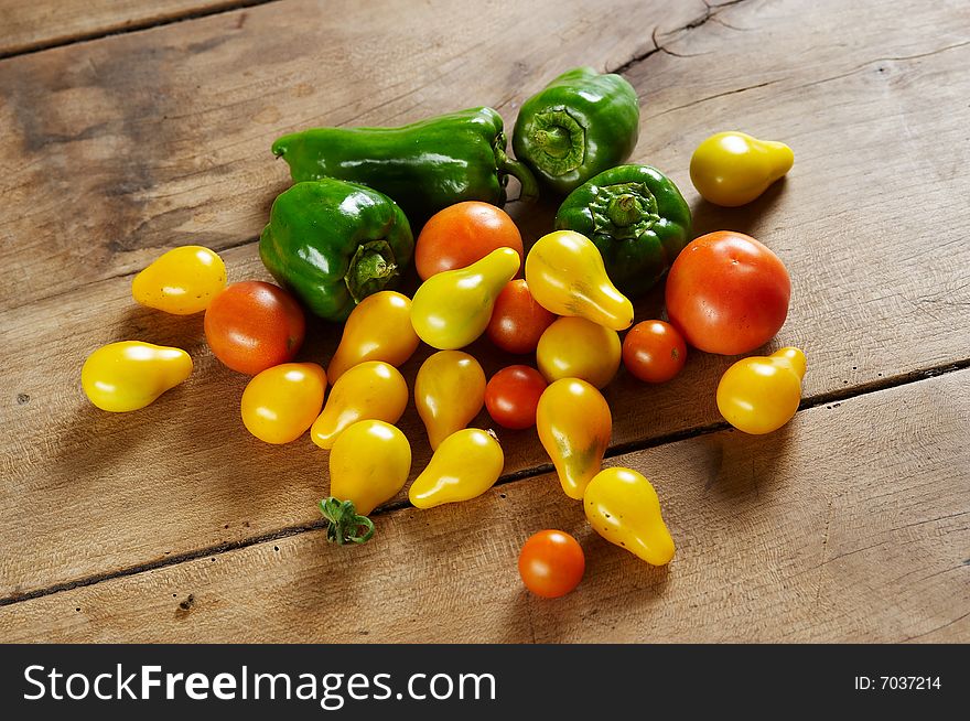 Group of different tomato and green pepper