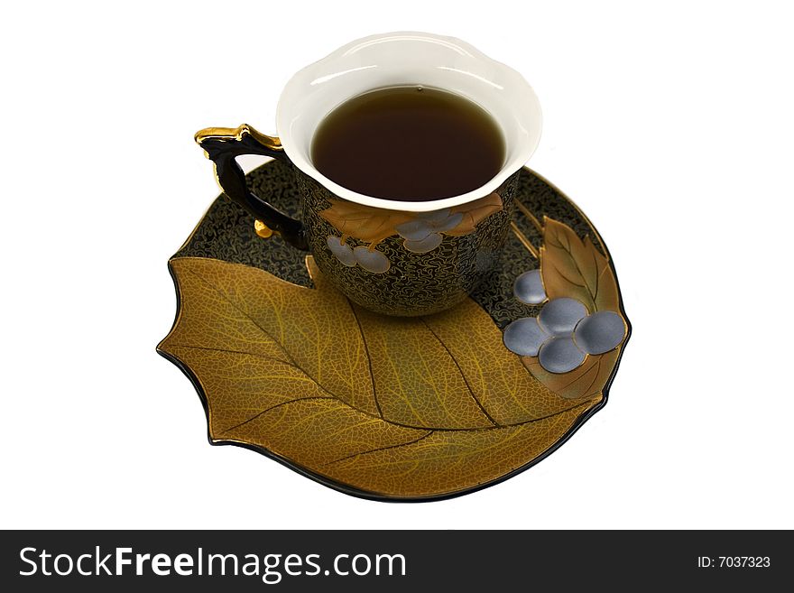 Cup with tea isolated on a white background