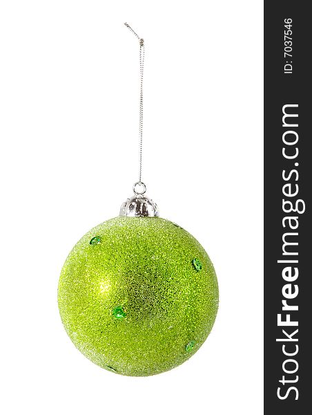 One green christmas ball on white ground