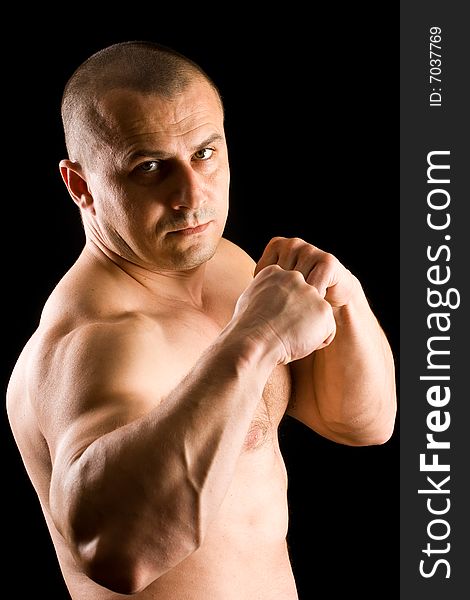 Muscular man fighting