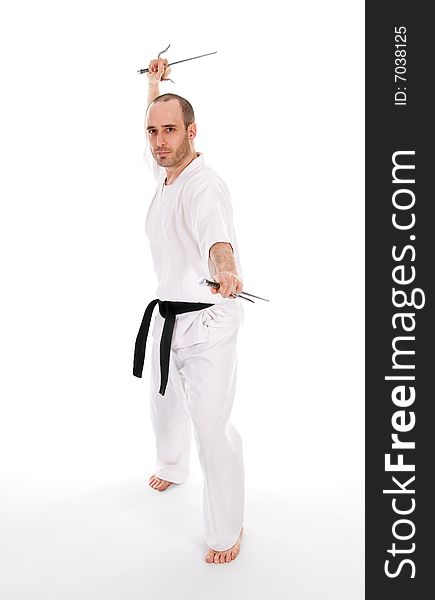 White man doing martial arts on isolated background