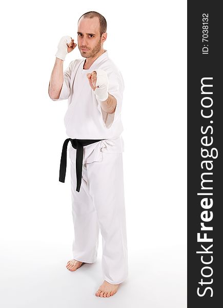 White man doing martial arts on isolated background