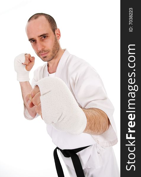 White man doing martial arts on isolated background