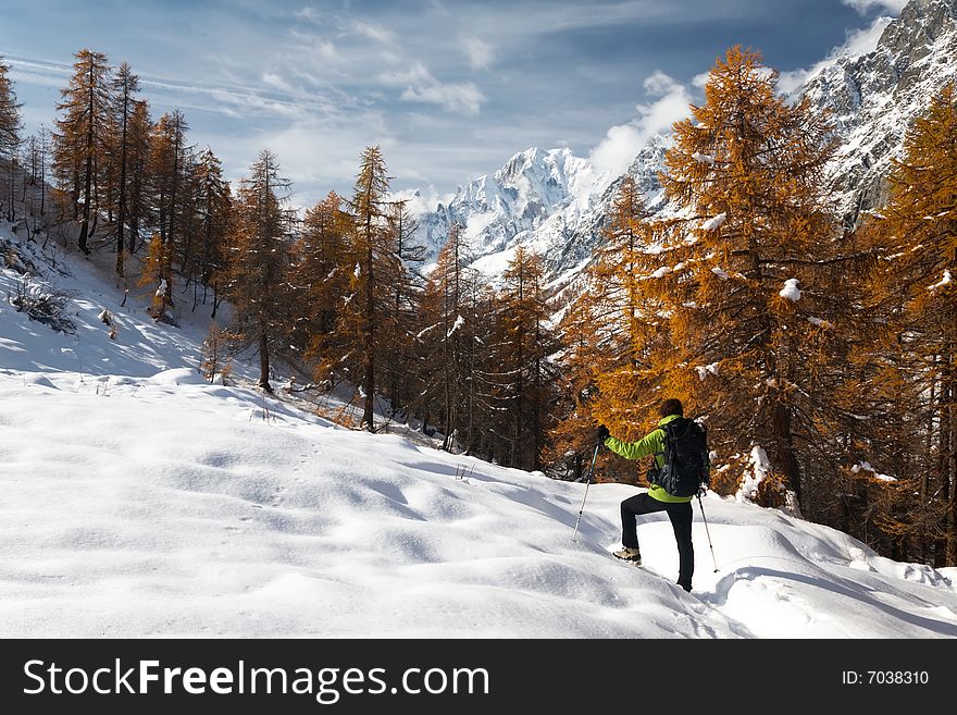 Hiker in a winter mountain landscape, Mont Blanc, Italy. Hiker in a winter mountain landscape, Mont Blanc, Italy