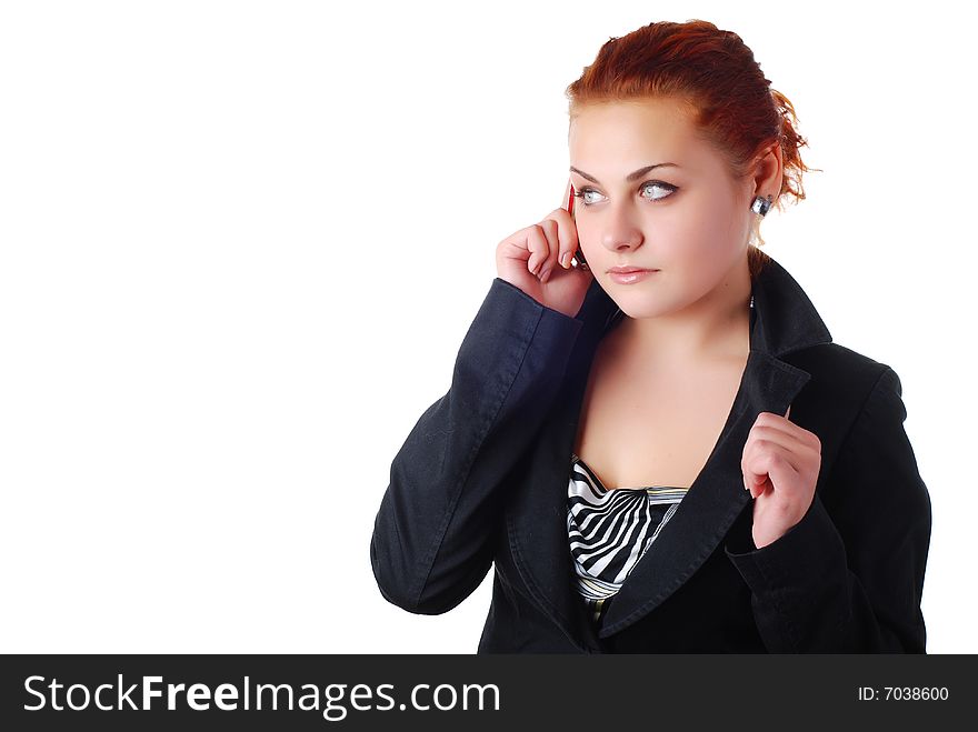 Business woman in a black suit with mobile phone