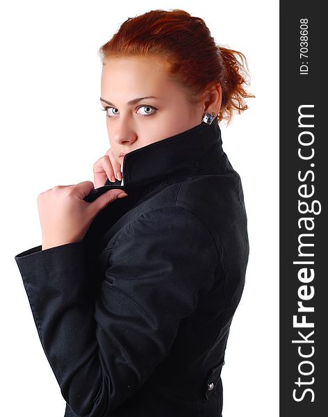 Beautiful woman with red hair in a black jacket. Beautiful woman with red hair in a black jacket
