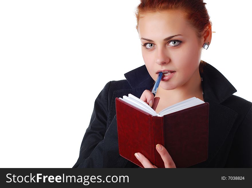 Beautiful business woman in black suit with notebook