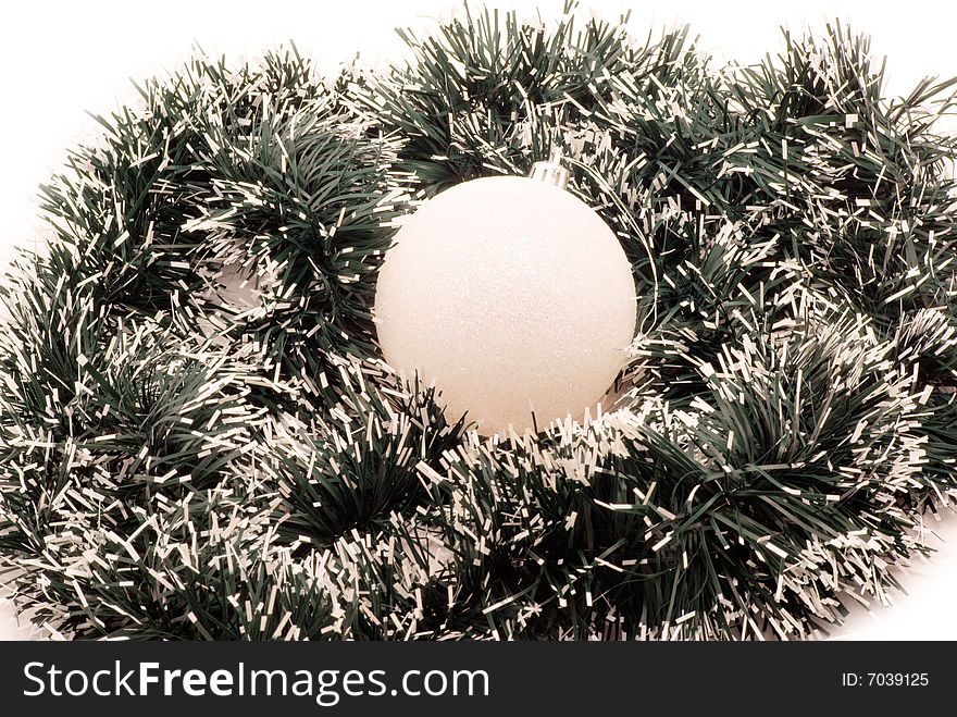 Christmas spheres and tinsel as a background. Christmas spheres and tinsel as a background