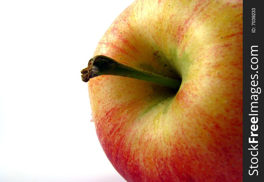 A red gala apple on a white background