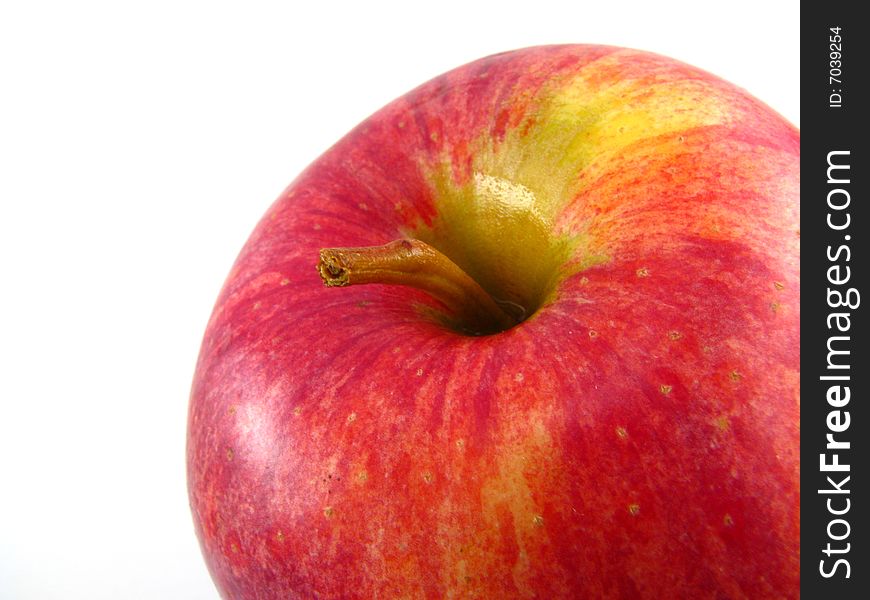 A red gala apple on a white background