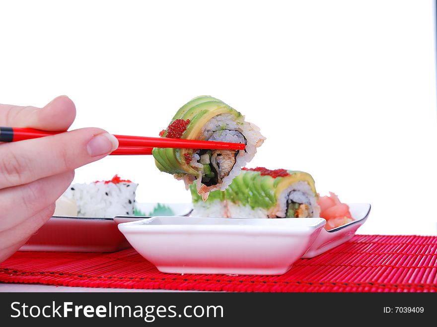 Holding One Roll With Chopsticks