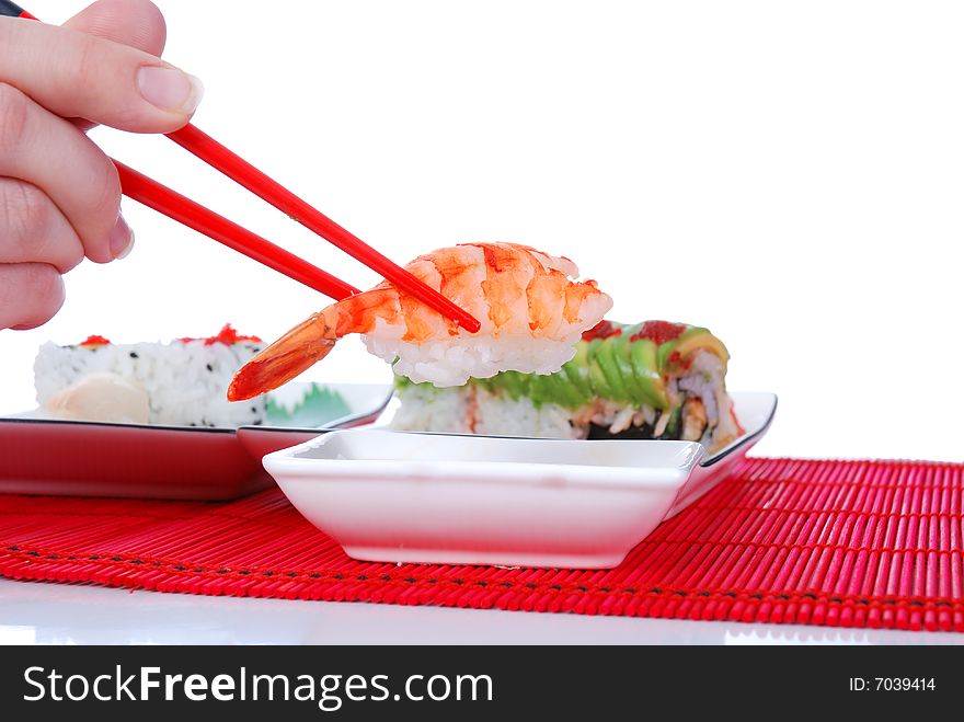 Holding shrimp with chopsticks