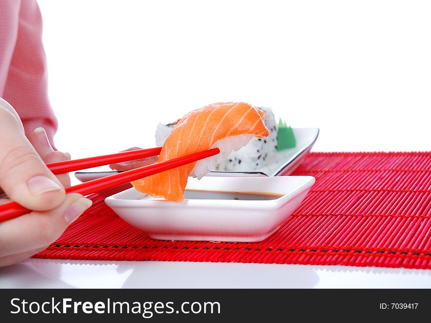 Set of rolls and sushi on several plates. Set of rolls and sushi on several plates