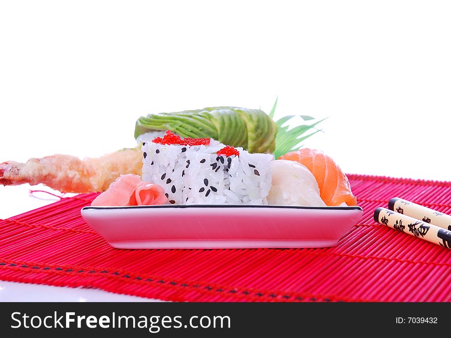 Set of rolls and sushi on several plates. Set of rolls and sushi on several plates