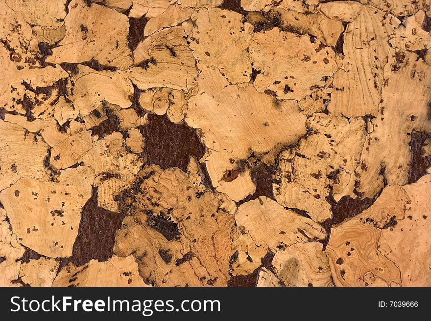 Close-up cork color textured background. Close-up cork color textured background