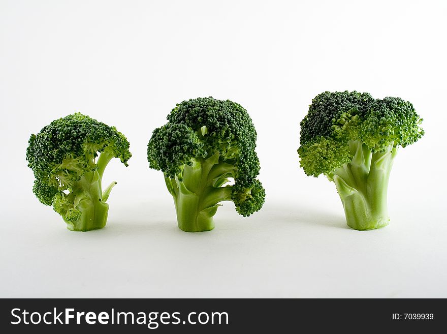 Close-up of three stalks of broccoli. Close-up of three stalks of broccoli