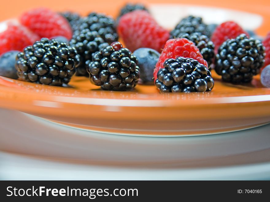 Fresh assorted berries on plate