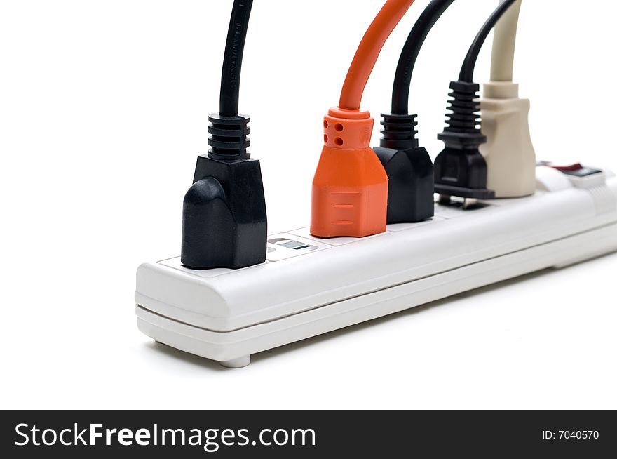 Five plugs in a power strip on a white background