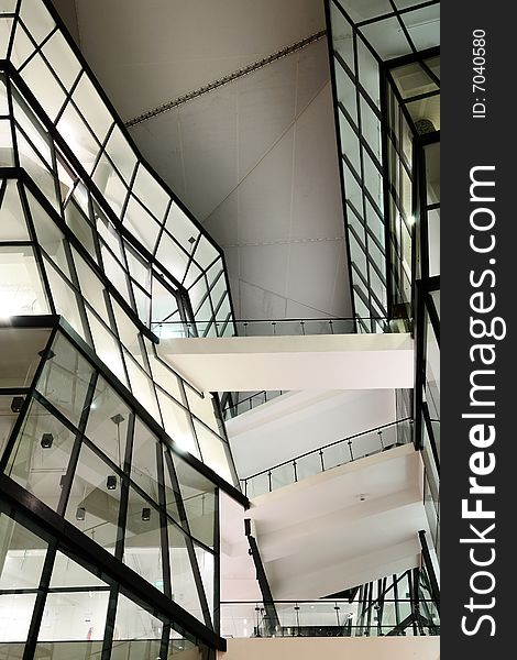 Modern architecture made up of mainly glass panels. Modern architecture made up of mainly glass panels