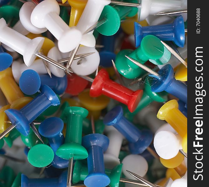 Colorful background of pile of push tacks. Colorful background of pile of push tacks