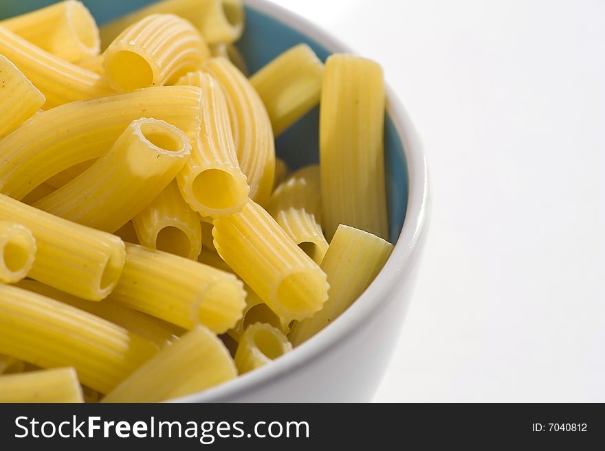 Fresh uncooked raw italian pasta isolated over white
