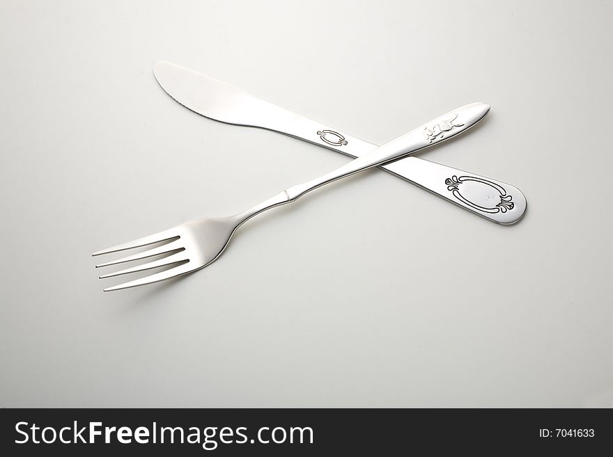 The knife and fork uses for the tableware which eats meal
