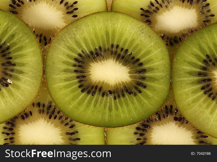 Slices of kiwi in macro view of the pulp