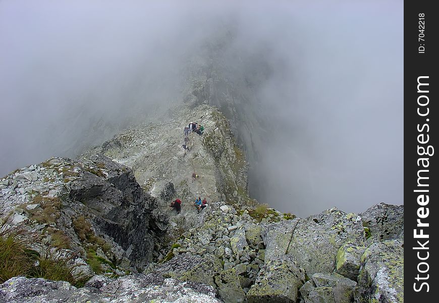 People Climbing For The Peak