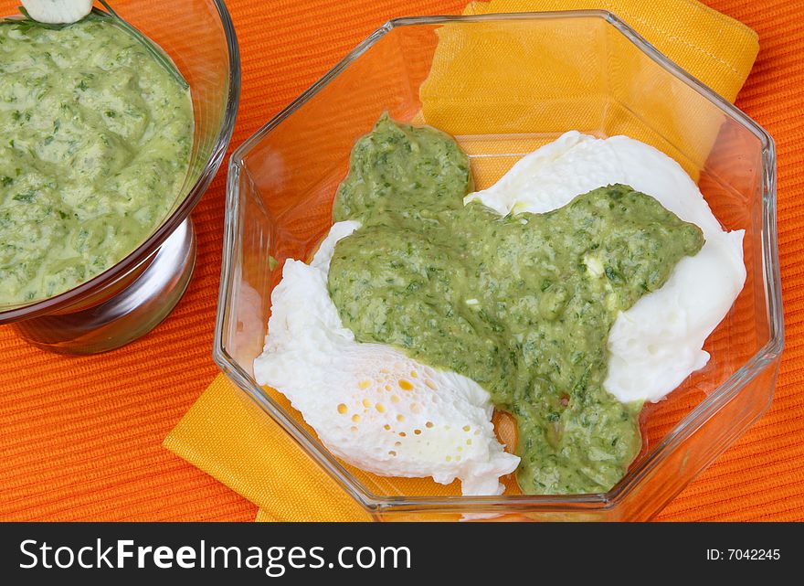 Salsa verde and cottage cheese sauce in glass bowl