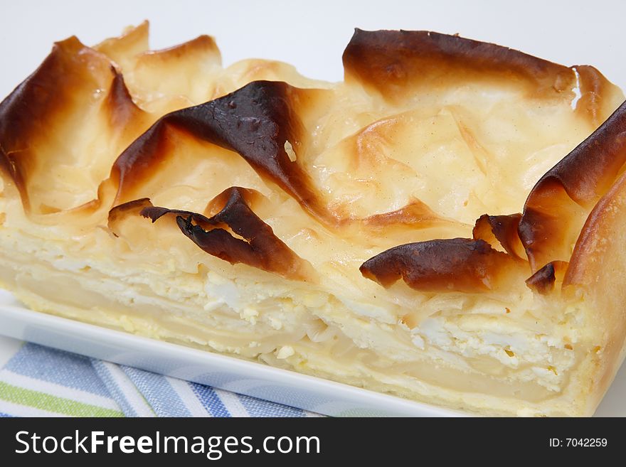 Piece of cottage cheese strudel on plate