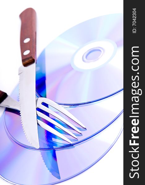 Fork and knife on the CD's. Cold color tones.