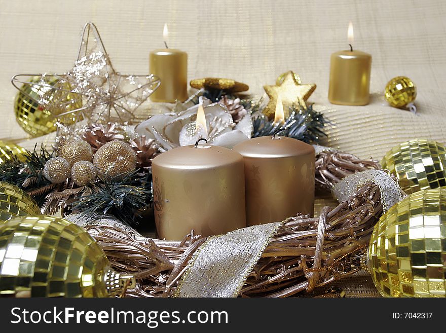 Golden candle and sphere like christmas decoration. Golden candle and sphere like christmas decoration