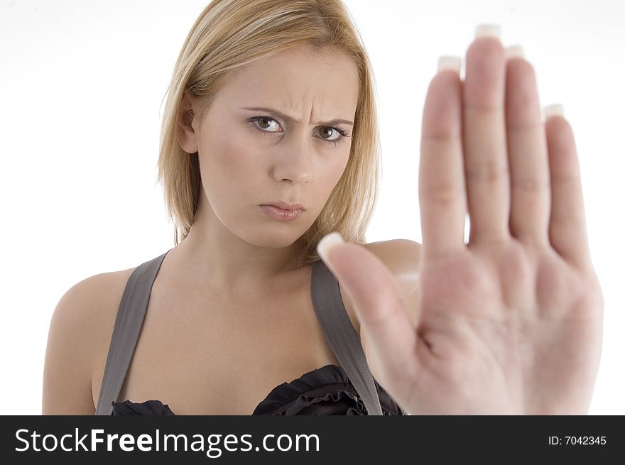 Angry woman showing stopping gesture on an isolated white background