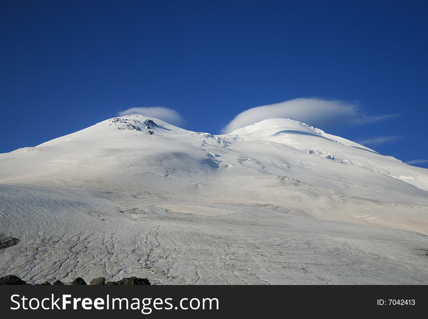 Clouds cought by the peaks of elbrus