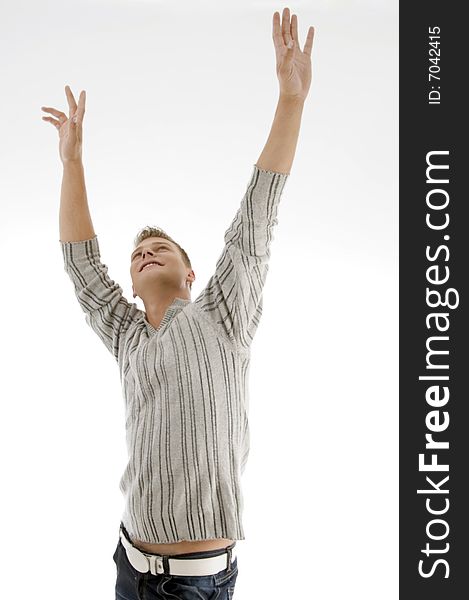 Smiling man stretching his arms on an isolated white background