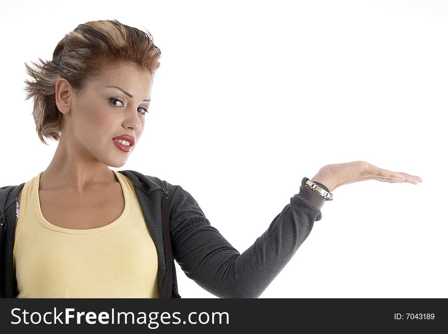 Attractive woman with open palm on an isolated background