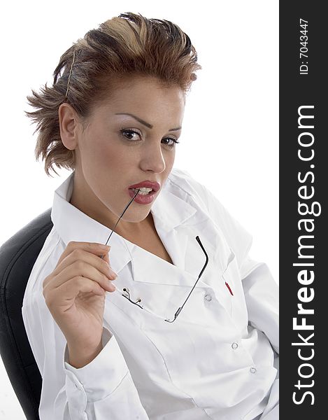 Sitting doctor with eyeglasses on an isolated background