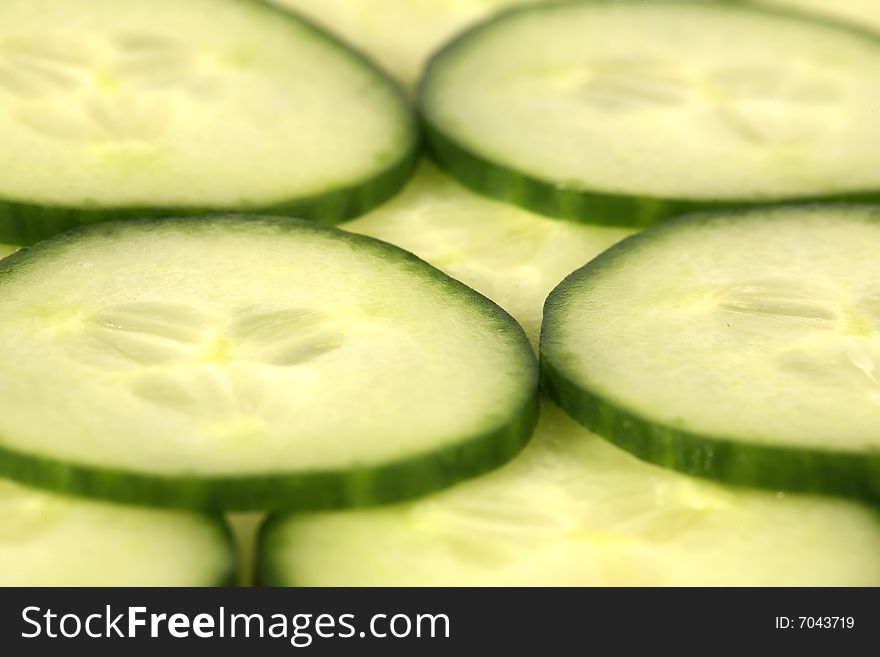 Slices of green cucumber in detailed view