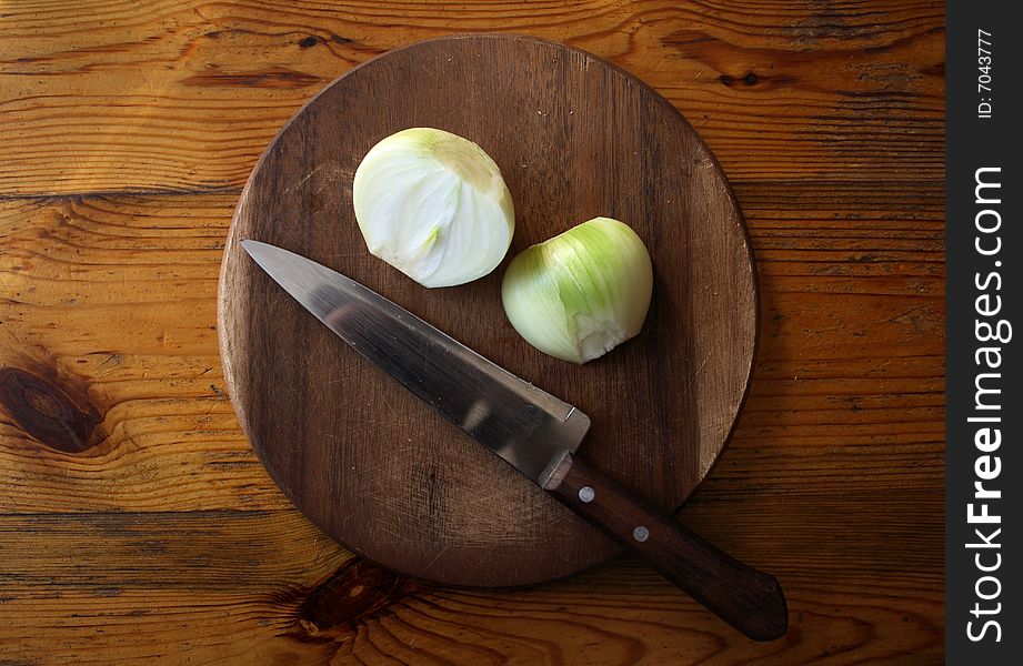 Onion On Wood Cutting Board. Onion On Wood Cutting Board
